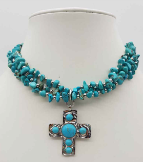 Turquoise chip stone multi-strand necklace with rhodium silver cross pendant featuring turquoise stone inlays