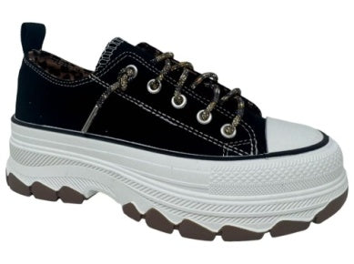 Very G black canvas platform sneakers with white chunky sole, gold laces, and leopard print lining detail.