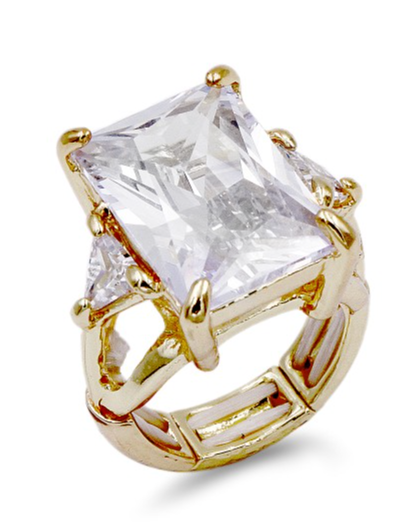 Gold plated cocktail ring with large rectangular clear crystal stone and decorative stretch band