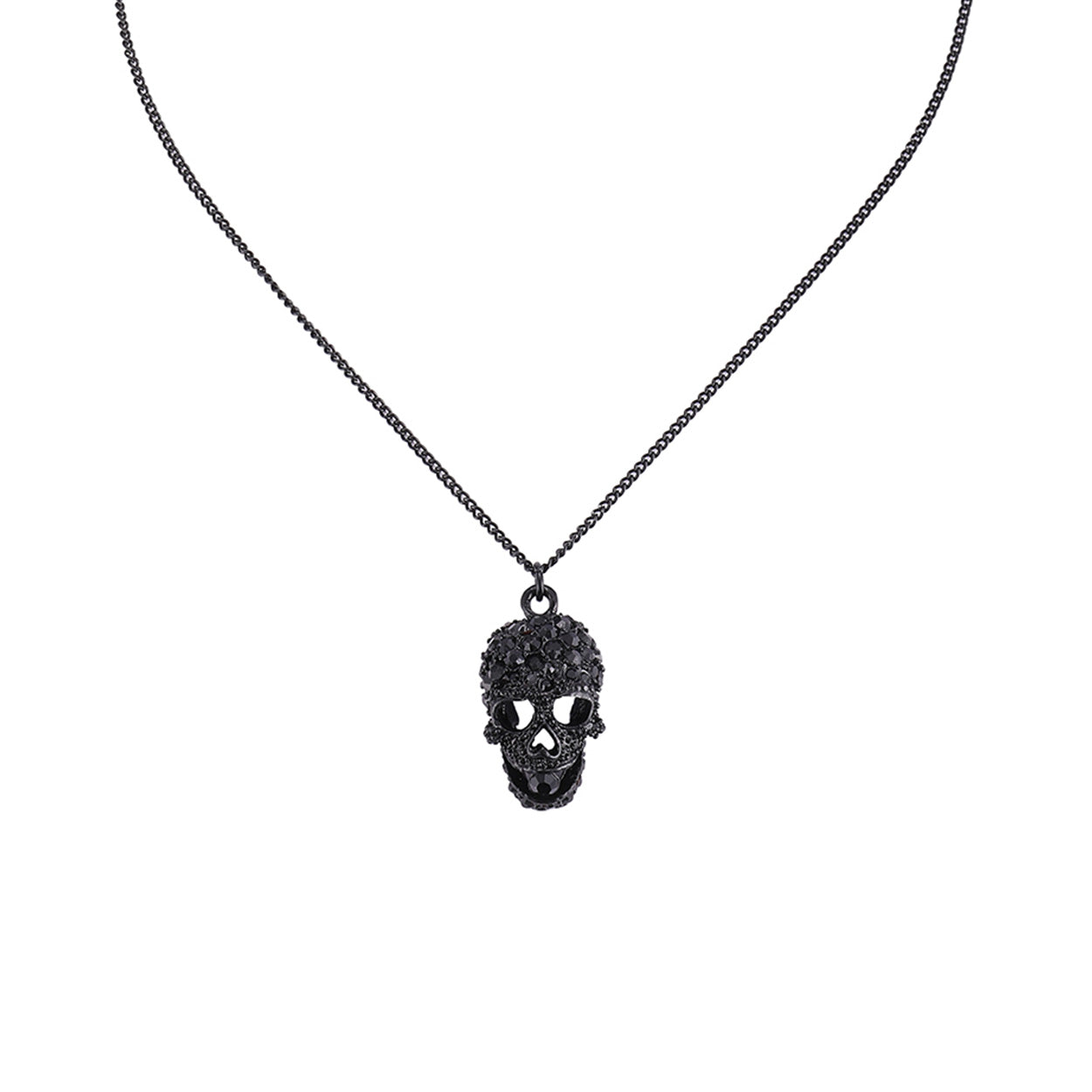 Black crystal pavé skull pendant necklace on delicate gunmetal curb chain with heart nose and hollow eye details
