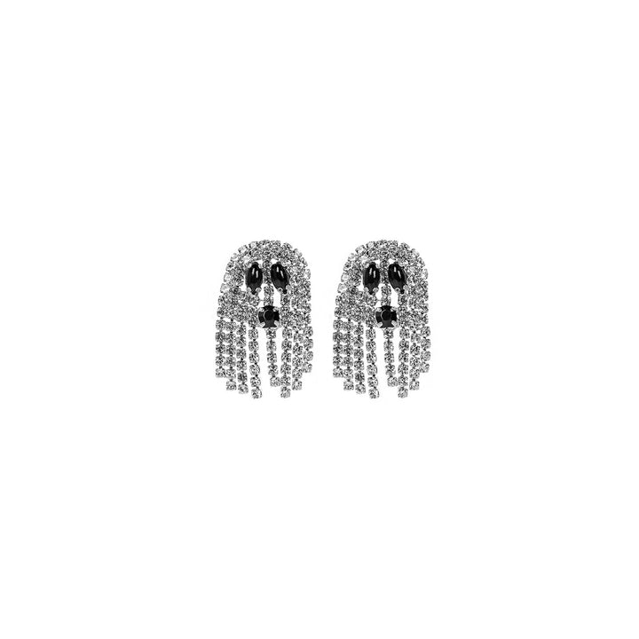 Silver crystal rhinestone ghost drop earrings with black gemstone eyes and cascading fringe strands